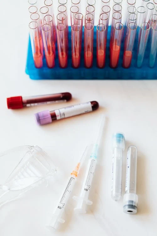 New Test to Detect Heart Disease in Women: A 30-Year Predictive Study 13 bottles in a lab to conduct blood tests