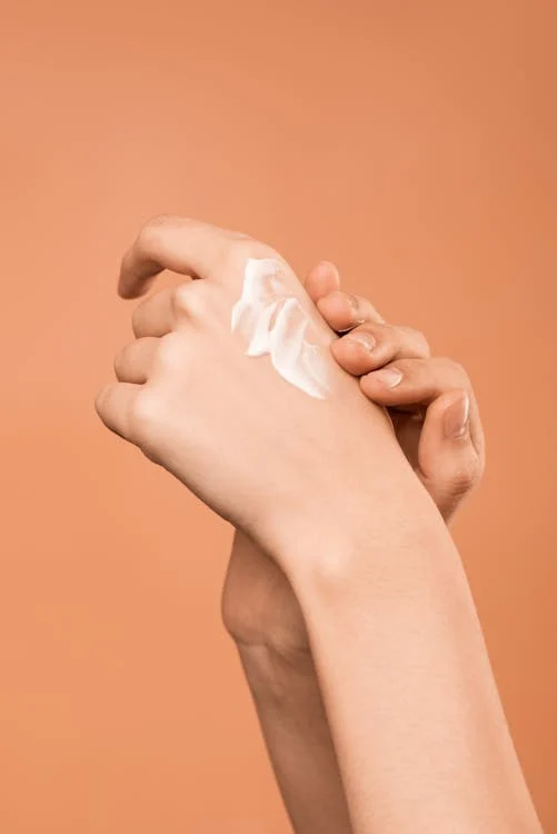 5 At-Home Sunburn Remedies for Rapid Recovery 15 applying sunburn cream over the hand soothing lotions