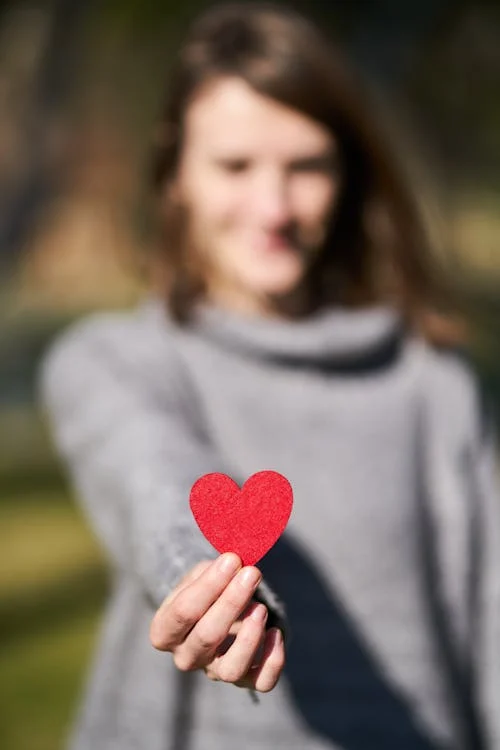 New Test to Detect Heart Disease in Women: A 30-Year Predictive Study 15 woman holding a red heart card wegovy for heart diseases