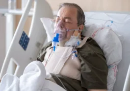 sick man in hospital and on oxygen