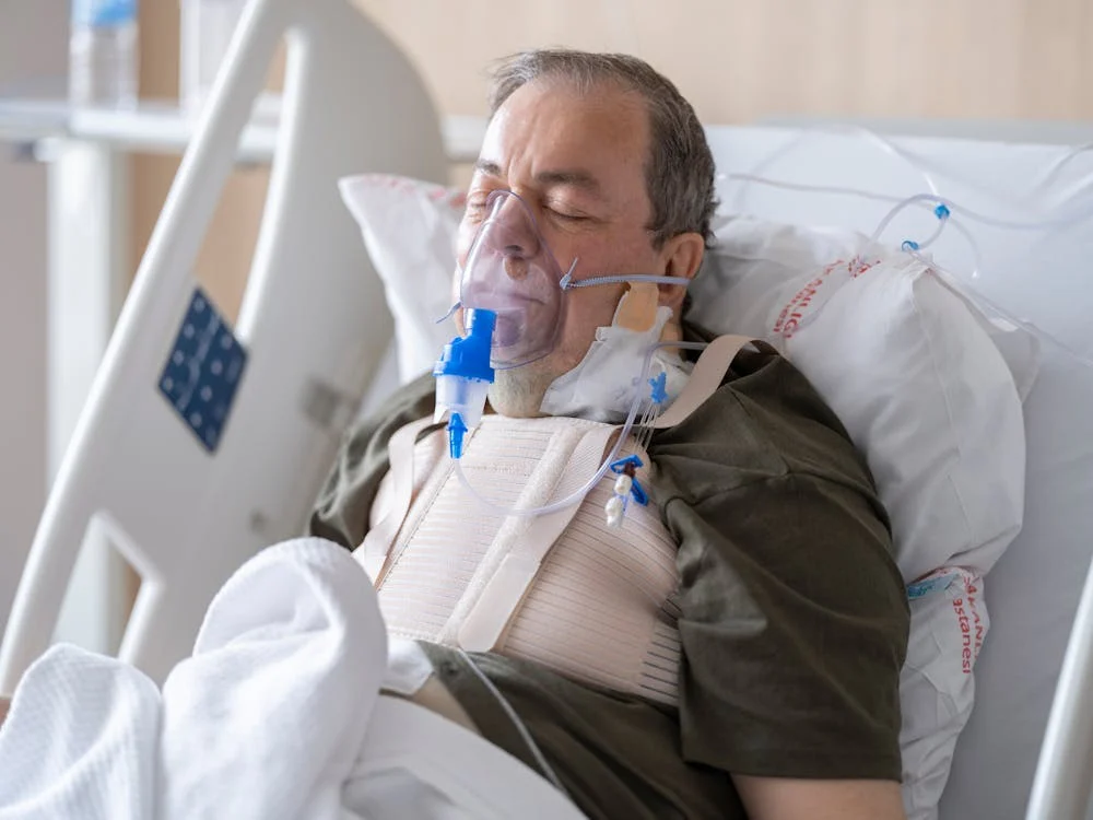 sick man in hospital and on oxygen